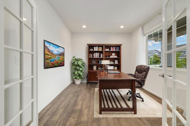 6692 S Robertsdale Way, Aurora, CO 80016 - office area featuring wood finished floors, recessed lighting, and french doors