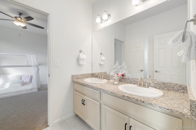 6692 S Robertsdale Way, Aurora, CO 80016 - full bath with double vanity, a ceiling fan, and tile patterned floors