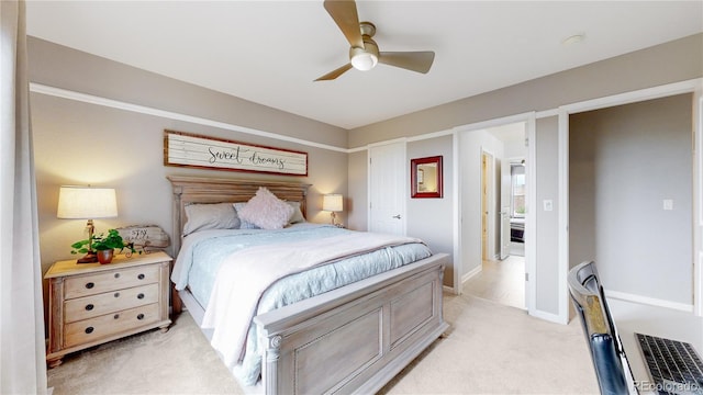 bedroom featuring ceiling fan and light colored carpet