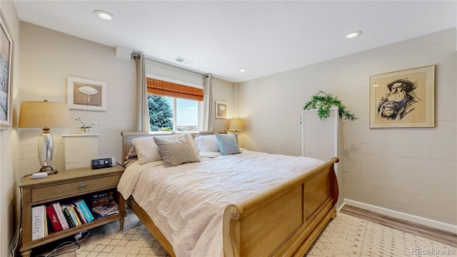 bedroom featuring light hardwood / wood-style flooring