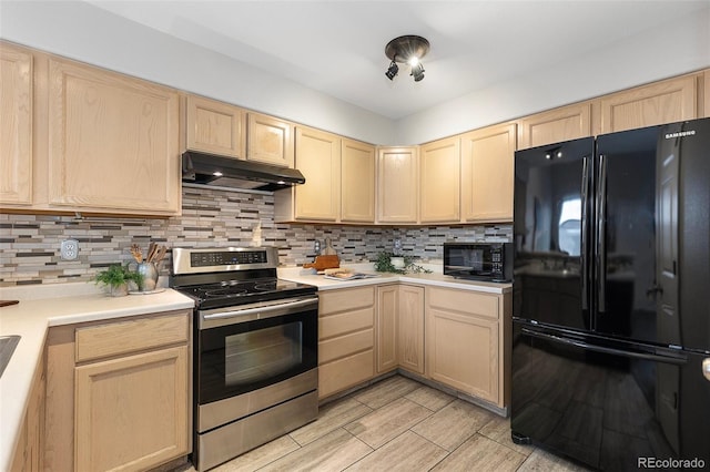 6450 W 44th Pl Unit B3, Wheat Ridge, CO 80033 - kitchen with black appliances, under cabinet range hood, and light brown cabinets