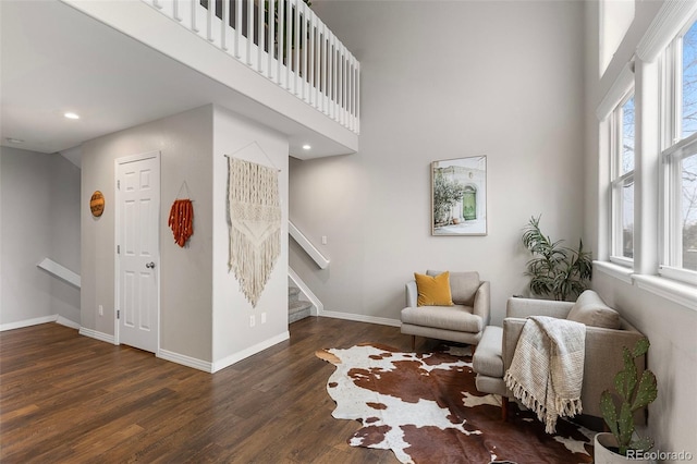 6450 W 44th Pl Unit B3, Wheat Ridge, CO 80033 - sitting room featuring stairway, wood finished floors, a high ceiling, baseboards, and recessed lighting