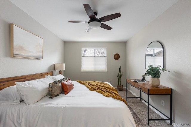 6450 W 44th Pl Unit B3, Wheat Ridge, CO 80033 - bedroom featuring carpet, a ceiling fan, and baseboards