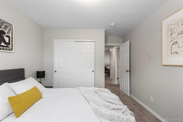 6450 W 44th Pl Unit B3, Wheat Ridge, CO 80033 - carpeted bedroom with a closet and baseboards