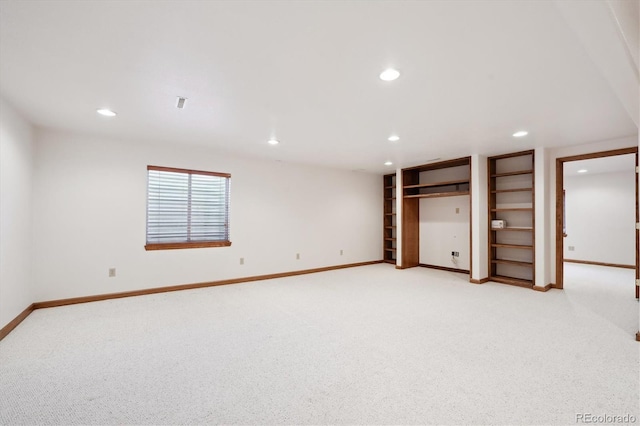 unfurnished bedroom featuring light colored carpet