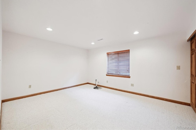 unfurnished room featuring carpet flooring