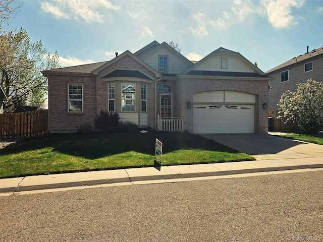 11144 Navajo St, Northglenn, CO 80234 - single story home featuring fence, concrete driveway, brick siding, and a front yard