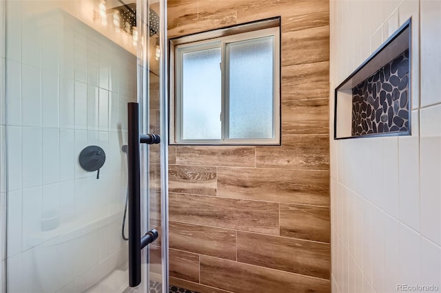 full bath with a shower stall