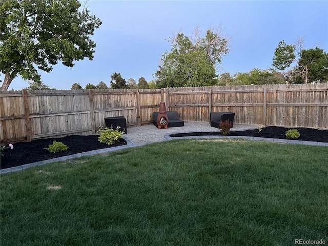 view of yard with a fenced backyard