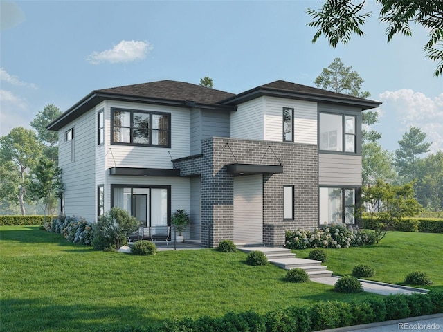 view of front of home with a front yard and a patio