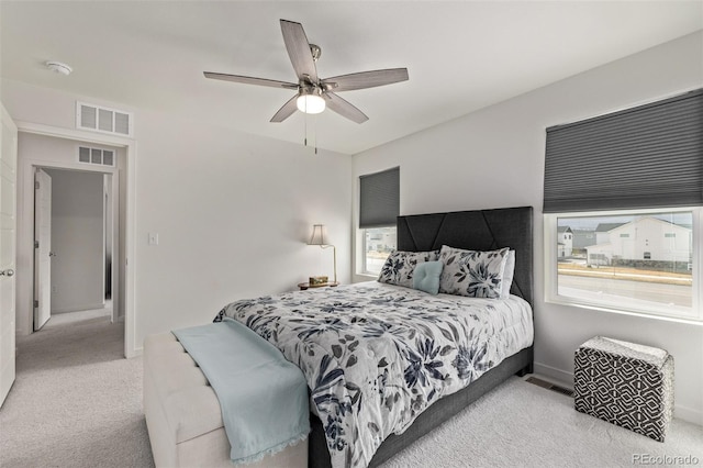 515 Bridger Ave, Fort Lupton, CO 80621 - bedroom with carpet flooring, visible vents, and ceiling fan