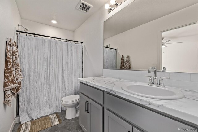 515 Bridger Ave, Fort Lupton, CO 80621 - full bathroom featuring a shower with curtain, a ceiling fan, toilet, visible vents, and vanity