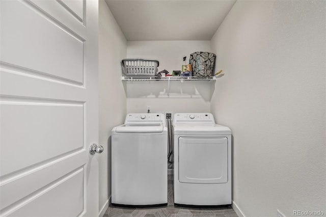 515 Bridger Ave, Fort Lupton, CO 80621 - clothes washing area featuring washer and dryer, laundry area, and baseboards