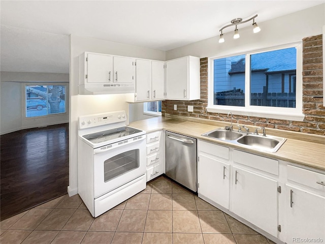 kitchen featuring white electric range oven, sink, dishwasher, white cabinets, and light hardwood / wood-style floors