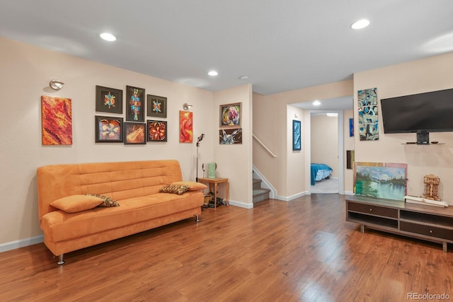 17332 E Lake Ln, Aurora, CO 80016 - living room with wood finished floors, stairs, baseboards, and recessed lighting