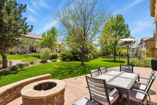 17332 E Lake Ln, Aurora, CO 80016 - view of patio / terrace featuring a fire pit and outdoor dining space