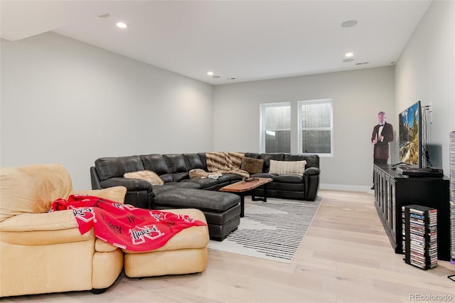 living room with light hardwood / wood-style floors