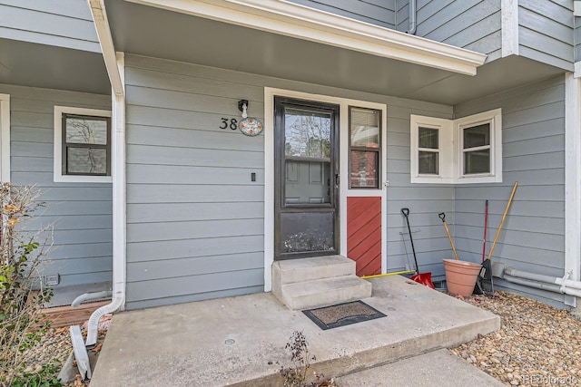 doorway to property with a porch