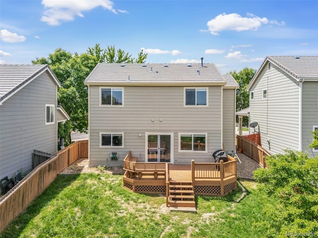 19463 E Hollow Creek Dr, Parker, CO 80134 - back of house with a fenced backyard and a wooden deck