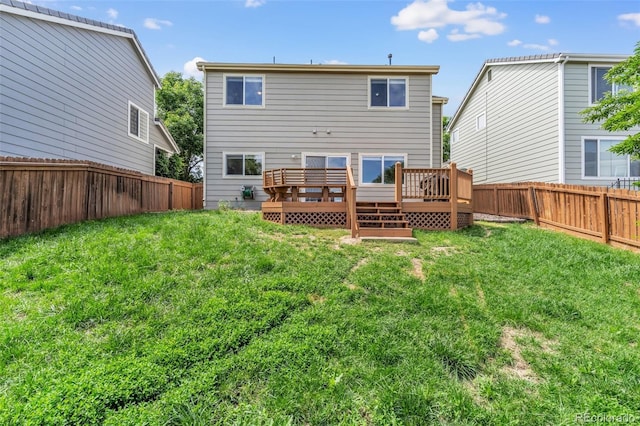 19463 E Hollow Creek Dr, Parker, CO 80134 - back of house with a wooden deck and a fenced backyard