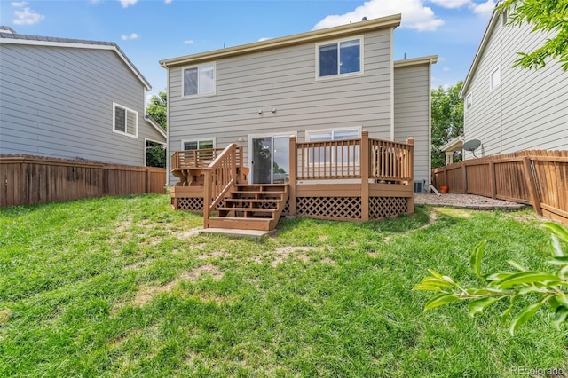 19463 E Hollow Creek Dr, Parker, CO 80134 - back of property featuring a fenced backyard and a wooden deck