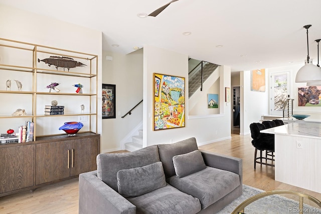 766 Dreamcatcher Ln, Evergreen, CO 80439 - living area featuring light wood-type flooring and stairs