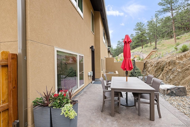 766 Dreamcatcher Ln, Evergreen, CO 80439 - view of patio / terrace featuring outdoor dining space