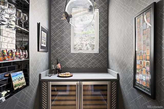 766 Dreamcatcher Ln, Evergreen, CO 80439 - indoor dry bar featuring wine cooler and tile walls