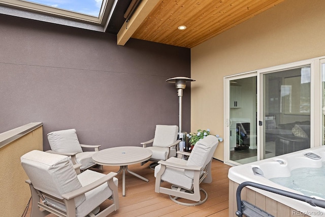 766 Dreamcatcher Ln, Evergreen, CO 80439 - wooden deck featuring a hot tub