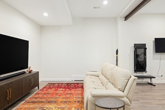 766 Dreamcatcher Ln, Evergreen, CO 80439 - living area featuring recessed lighting, light wood-style floors, and baseboard heating