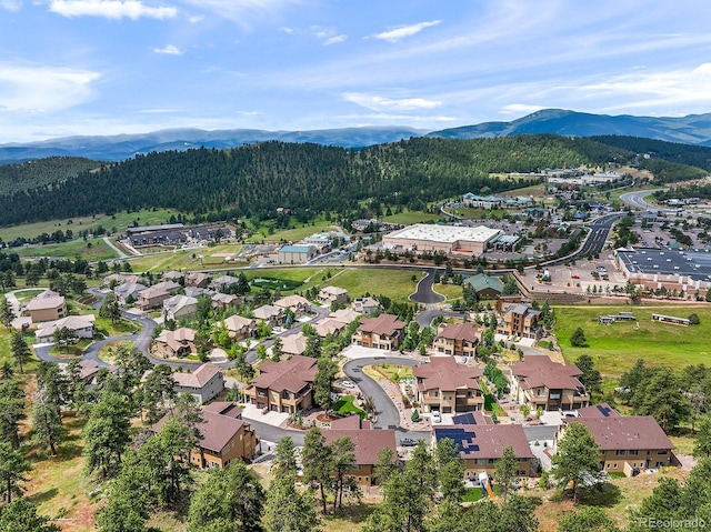 766 Dreamcatcher Ln, Evergreen, CO 80439 - drone / aerial view of mountains and a heavily wooded area