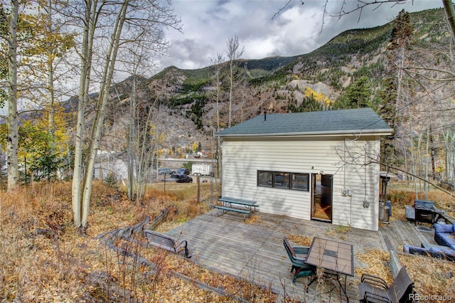 view of outbuilding featuring a mountain view