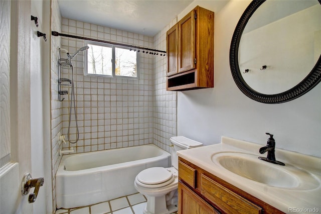 full bathroom with vanity, toilet, and tiled shower / bath