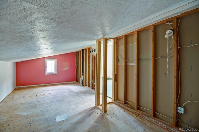 misc room featuring vaulted ceiling