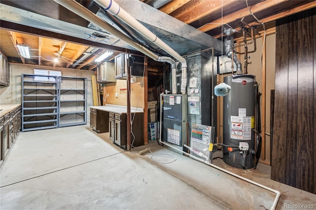 unfinished below grade area with gas water heater and heating unit