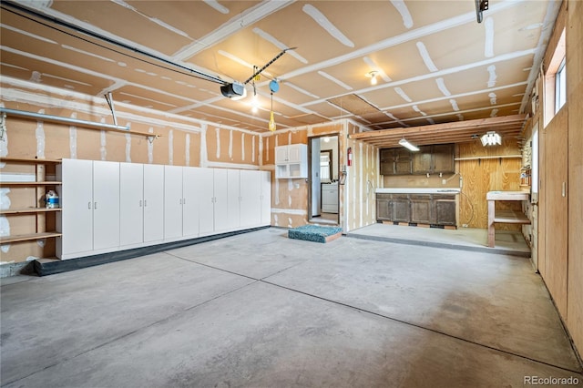 garage featuring a garage door opener