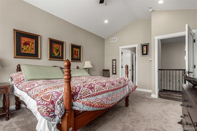 carpeted bedroom featuring lofted ceiling