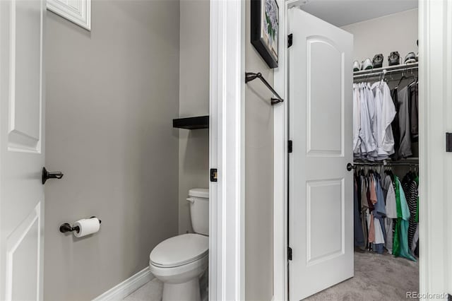 bathroom featuring toilet