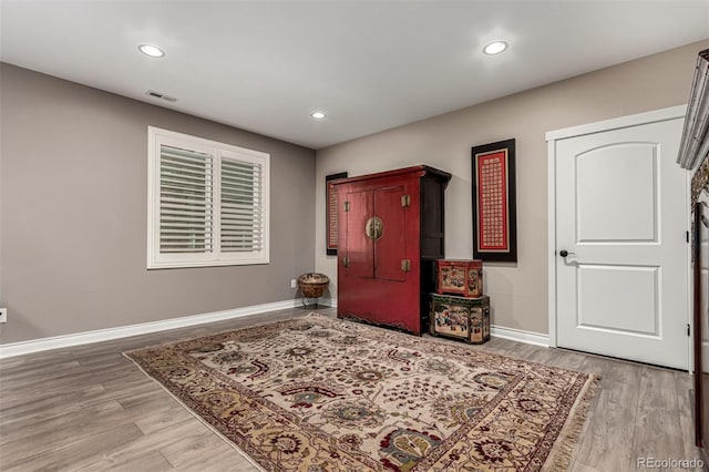 foyer with light hardwood / wood-style floors