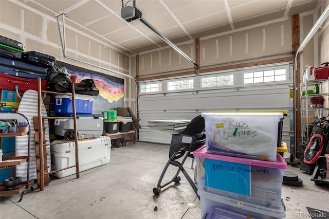 garage featuring a garage door opener