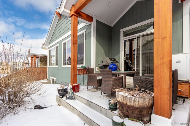 view of snow covered patio