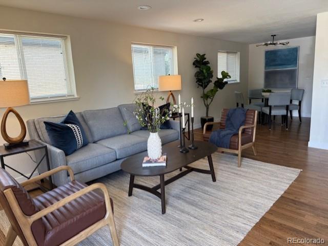 2510 Kenton, Aurora, CO 80010 - living area featuring wood finished floors, recessed lighting, and a chandelier