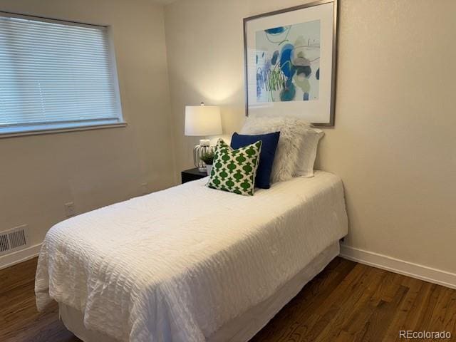 2510 Kenton, Aurora, CO 80010 - bedroom featuring wood finished floors and baseboards