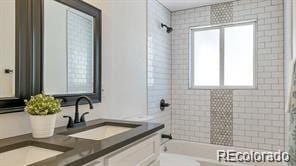 2510 Kenton, Aurora, CO 80010 - full bath with double vanity and shower / bath combination