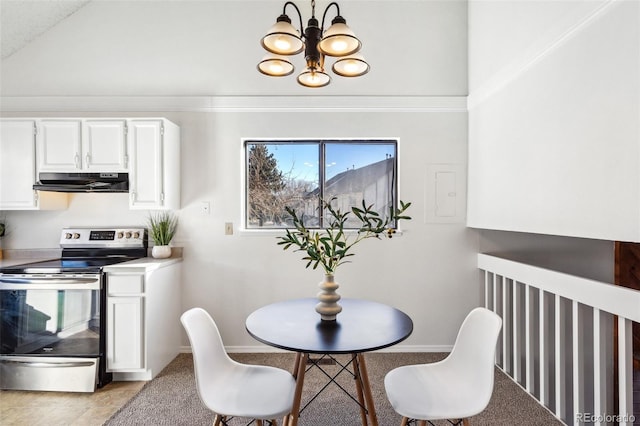 dining space with an inviting chandelier