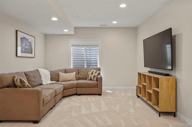 living room featuring baseboards, light carpet, visible vents, and recessed lighting