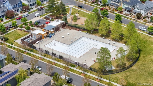 birds eye view of property with a residential view