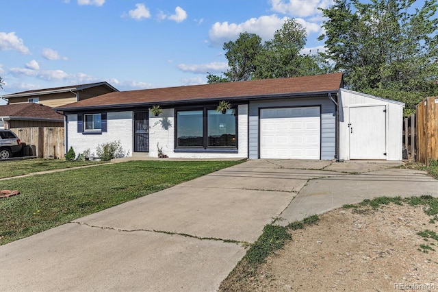 8641 Lowell Blvd, Westminster, CO 80031 - ranch-style house with an attached garage, driveway, and brick siding
