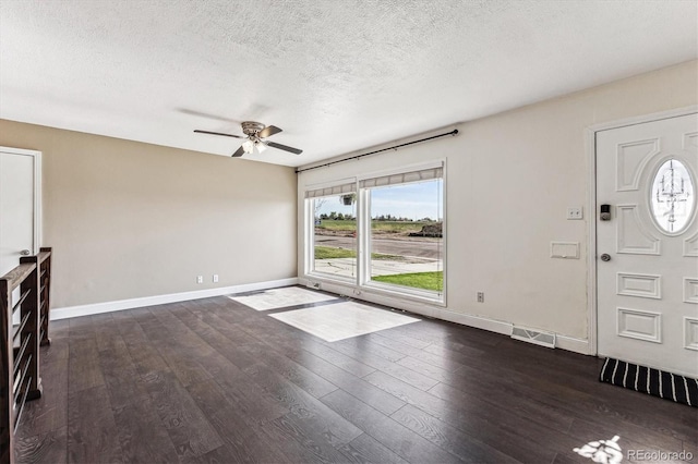 8641 Lowell Blvd, Westminster, CO 80031 - entryway with a ceiling fan, dark wood-style floors, a textured ceiling, and baseboards