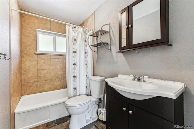 8641 Lowell Blvd, Westminster, CO 80031 - bathroom featuring vanity, toilet, shower / bath combo, and a textured wall